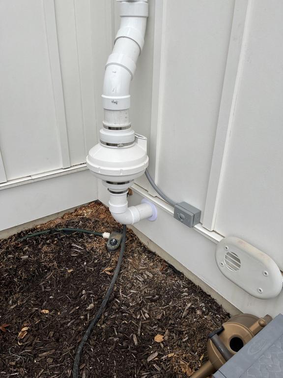 Exterior radon mitigation vent pipe