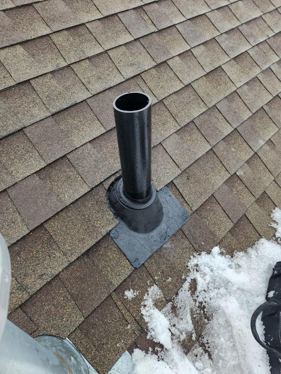 Interior radon mitigation pipe installation